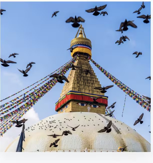 Boudhanath stupa beneath a blue sky